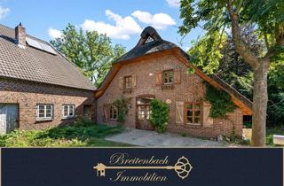 Haus kaufen in 26349 Jade, Reetdachanwesen mit großzügigem Grundstück und vielseitigem Nebengebäude