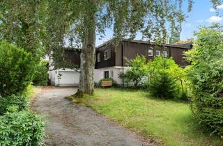 Einfamilienhaus kaufen in 82343 Pöcking, Charmantes Einfamilienhaus in Pöcking mit Pool, Doppelgarage und idyllischem Garten