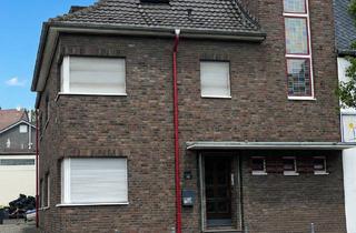 Gewerbeimmobilie kaufen in Köln-Aachener-Straße 75, 50127 Bergheim, Multifunktionales Geschäftsgebäude mit separatem Hallengebäude und 32 Parkplätzen in bester Citylage