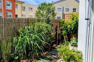 Wohnung kaufen in 55291 Saulheim, Traumhafte Hochpaterrewohnung mit privatem Gartenparadies und Klimaanlage