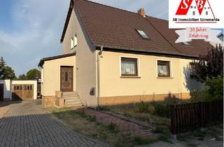 Doppelhaushälfte kaufen in 99625 Kölleda, Doppelhaushälfte mit Garage und einem ausreichend großen Gartengrundstück in Kölleda zu verkaufen!