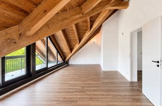 Wohnung kaufen in 82152 Krailling, AIGNER - Dachgeschosswohnung mit Süd-Balkon in zentraler Lage von Krailling