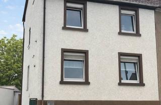 Doppelhaushälfte kaufen in 64846 Groß-Zimmern, Sanierungsbedürftige Doppelhaushälfte mit Hof und Garten in zentraler Lage