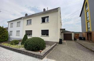 Doppelhaushälfte kaufen in 66787 Wadgassen, Schöne Doppelhaushälfte mit Garten und Garage in ruhiger Lage