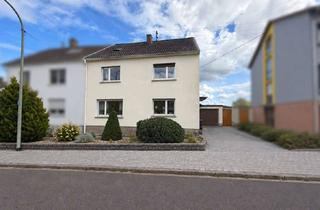 Doppelhaushälfte kaufen in 66787 Wadgassen, Schöne Doppelhaushälfte mit Garten und Garage in ruhiger Lage