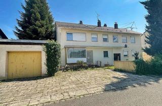 Mehrfamilienhaus kaufen in 83301 Traunreut, Mehrfamilienhaus mit 3 Wohnungen und Gewerbeeinheit - zentrale Lage, vielseitige Möglichkeiten
