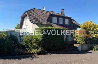 Einfamilienhaus kaufen in 56220 Bassenheim, Großzügiges Einfamilienhaus mit Indoor-Schwimmbad in ruhiger Ortsrandlage