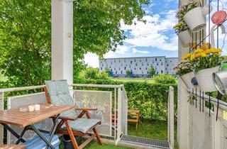 Wohnung kaufen in 85757 Karlsfeld, Karlsfeld: 2,5-Zimmer-Gartenwohnung mit direkt angebundenem Hobbyraum