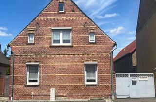 Haus kaufen in Dübener Str. 38, 06774 Rösa, charmantes Zweifamilienhaus in Rösa