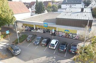 Gewerbeimmobilie kaufen in 74211 Leingarten, Faktor 11,9! Langfristig vermietete Ladenfläche mit Penthouse-Wohnung