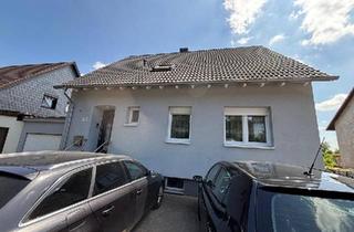 Einfamilienhaus kaufen in 66265 Heusweiler, Heusweiler - Charmantes Einfamilienhaus mit Einliegerwohnung zu verkaufen