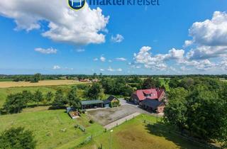 Haus kaufen in 26487 Blomberg, Zweifamilienhaus mit zusätzlichem Weideland, Nebengebäuden und Teichanlage in Traumlage!