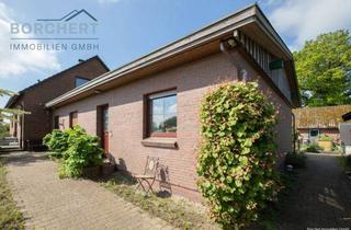 Haus kaufen in 25355 Heede, Ebenerdiger Bungalow im Doppelhausstil im Grünen von Heede zu verkaufen