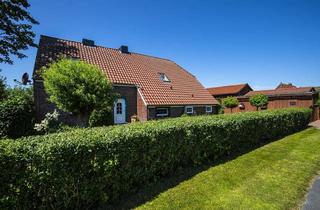 Haus kaufen in 26409 Wittmund, Charmantes Wohnen in idyllischer Ortsrandlage