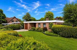 Haus kaufen in Norderneystraße 23, 26919 Brake, Schöner Bungalow mit Wintergarten und Baugrundstück in ruhiger Wohnlage im Inselviertel