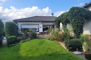 Haus kaufen in 64409 Messel, Familienglück im Grünen – Bungalow mit traumhaftem Garten und Einliegerwohnung