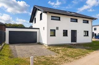 Haus kaufen in Fasanenring 29, 38473 Tiddische, Hochwertiges Neubau-Energiesparhaus mit moderner Ausstattung und großzügigem Wohnkonzept