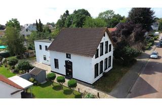 Haus kaufen in 26919 Brake, Vielseitiges Wohnhaus mit drei Wohneinheiten in Brake