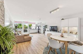 Wohnung kaufen in 35447 Reiskirchen, Wohnen auf hohem Niveau – Großzügige Erdgeschosswohnung mit Terrassen und Carport in Reiskirchen!