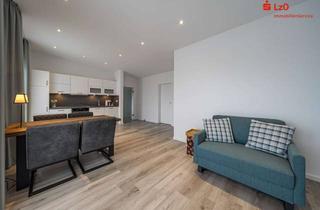 Wohnung kaufen in 26160 Bad Zwischenahn, Möblierte Wohnung mit großer Dachterrasse zum Erstbezug