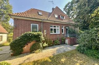 Einfamilienhaus kaufen in 49828 Neuenhaus, Charmantes Einfamilienhaus am Stadtgraben in Neuenhaus – Idyllisches Grundstück mit eigener klein
