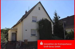 Einfamilienhaus kaufen in 65428 Rüsselsheim, Renovierungsbedürftiges Einfamilienhaus in der Böllensee-Siedlung
