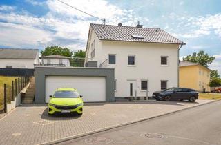 Einfamilienhaus kaufen in 54340 Bekond, Bekond: Junges Einfamilienhaus, Wärmepumpe, Wintergarten und große Garage mit Platz für mehrere PKW