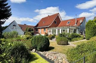 Einfamilienhaus kaufen in 23626 Ratekau, Einfamilienhaus mit Nebengebäude, Garage und herrlichem Grundstück