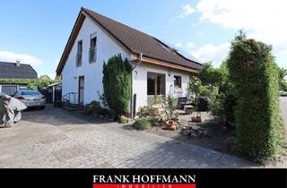 Einfamilienhaus kaufen in 25337 Kölln-Reisiek, Zwei Wohnbereiche unter einem Dach: Einfamilienhaus mit separater Einliegerwohnung in Kölln-Reisiek