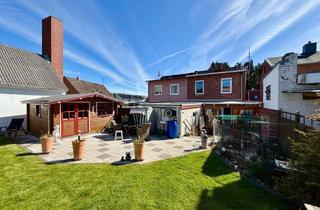 Doppelhaushälfte kaufen in 23560 Moisling, Liebevoll modernisiert – Doppelhaushälfte mit Wintergarten und vielen Extras