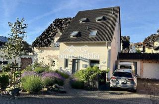 Doppelhaushälfte kaufen in 56220 Bassenheim, Modernisierte Doppelhaushälfte mit Wintergarten, Garage, Werkstatt und Traumgarten!