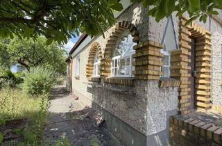Einfamilienhaus kaufen in 12524 Berlin, Altglienicke - Handwerkerobjekt mit viel Potential in ruhiger Lage