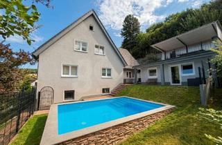 Haus kaufen in 63869 Heigenbrücken, Großzügiges Familienidyll mit Pool und Garten