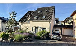Doppelhaushälfte kaufen in 56220 Bassenheim, Modernisierte Doppelhaushälfte mit Wintergarten, Garage, Werkstatt und Traumgarten!