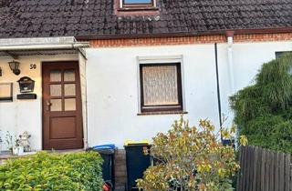 Haus kaufen in 23701 Eutin, Eutin - Reihenmittelhaus in ruhiger Lage am kleinen See in Eutin