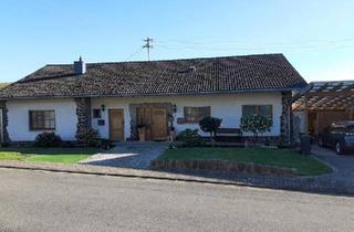 Mehrfamilienhaus kaufen in 66701 Beckingen, Beckingen - EinMehrfamilienhaus mit Carport und Stellplätzen