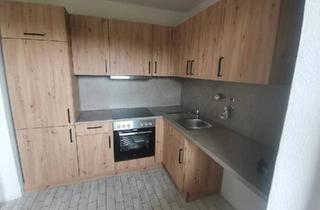 Wohnung kaufen in 25813 Husum, Husum - 2024 kernsaniert: 2 Zi. 50m² Fahrstuhl Garage ohne Makler