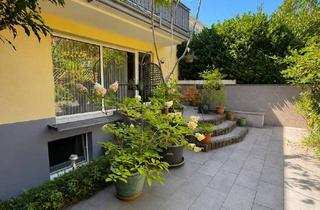 Wohnung kaufen in 51429 Bergisch Gladbach, Großzügiges Wohnen auf zwei Ebenen mit Garten in Bergisch Gladbach-Kaule