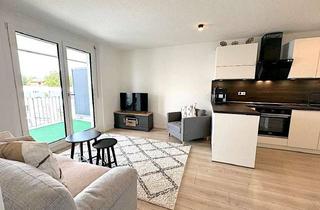 Wohnung kaufen in 35510 Butzbach, Helle moderne Wohnung mit großem Balkon und Tiefgaragenstellplatz