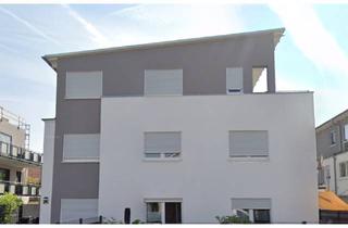 Wohnung kaufen in 63110 Rodgau, Lichtdurchflutete 3-Zimmer-Souterrainwohnung – Wohnen mit Stil und Komfort