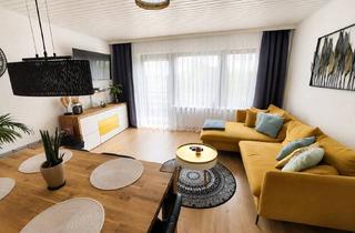 Wohnung kaufen in Ebersheimer Weg, 55294 Bodenheim, Gut geschnittene 3-Zimmer-Wohnung mit Balkon und Gartenanteil