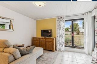 Wohnung kaufen in 55545 Bad Kreuznach, Architektonisch reizvolle 3-Zimmer-Wohnung mit Split-Level-Charakter und Terrasse ins Grüne