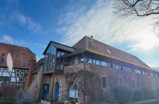 Wohnung kaufen in 61197 Florstadt, Außergewöhnliche Wohnung mit Galerie im Schloss-Ambiente und ruhiger Lage