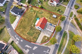 Haus kaufen in 97657 Sandberg, Exklusives Dennert-Fertighaus auf 2.100 m² – Familienidylle mit ELW-Option, Kamin & 3 Garagen