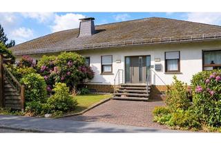 Haus kaufen in Am Weiher 16, 56290 Buch, Gepflegte Bungalow-DHH mit Einliegerwohnung und Fernblick
