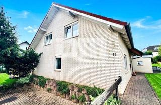 Haus kaufen in 35108 Allendorf, Großzügiges Ein- bis Zweifamilienhaus mit Terrasse und großem Garten