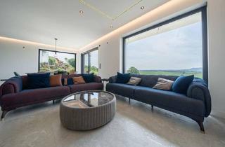 Haus kaufen in 35274 Kirchhain, Kirchhain - Moderne EG Wohnung mit großzügigem Garten mit Herrlichen Ausblick