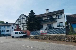 Haus kaufen in 36358 Herbstein, Herbstein - Ein- bis Zweifamilienhaus mit Werkstatt & 2 Garagen