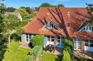 Wohnung kaufen in 18375 Ostseebad Prerow, Entzückende Ferienwohnung im Herzen von Prerow mit kleinem Gartenanteil