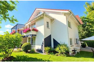 Wohnung kaufen in 55234 Erbes-Büdesheim, Stilvolle Architektenwohnung mit Galerieebene, Luxusküche & Sonnenbalkon